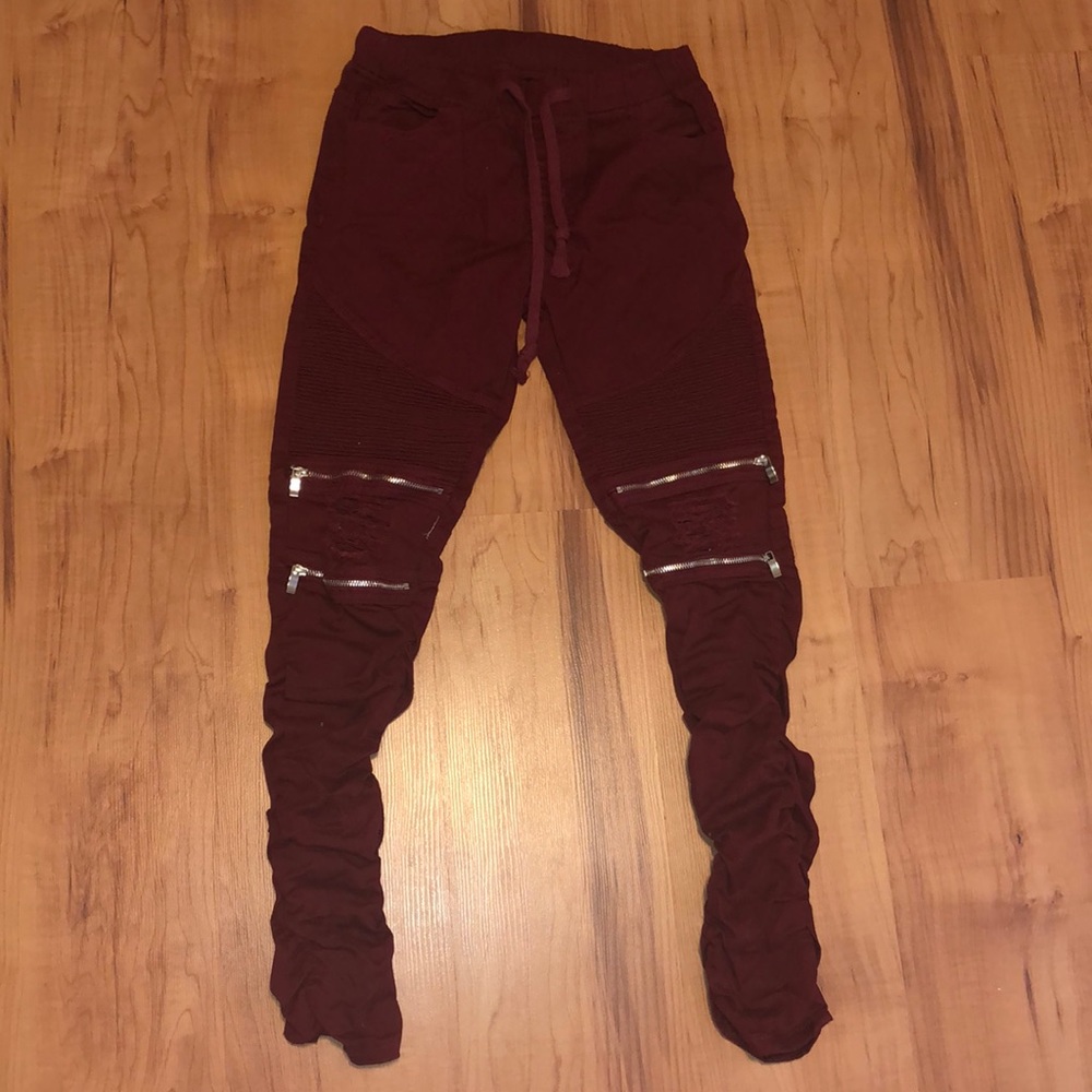 Burgundy jeans with zippers